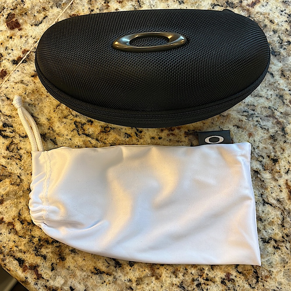 Oakley hard and soft case.
